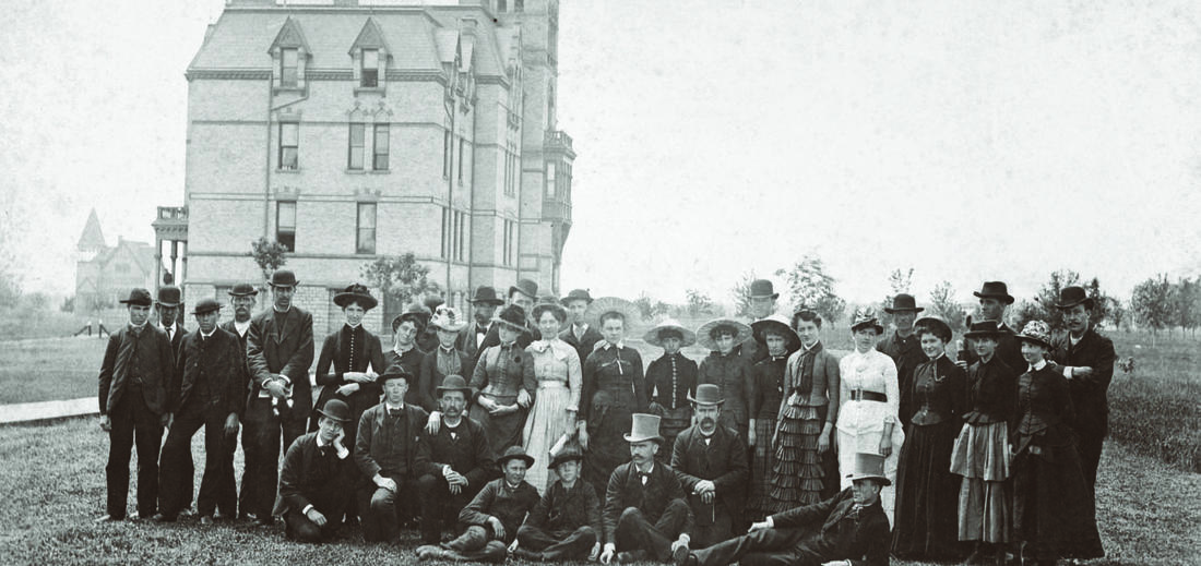 Old Main Building with  students in a historical image