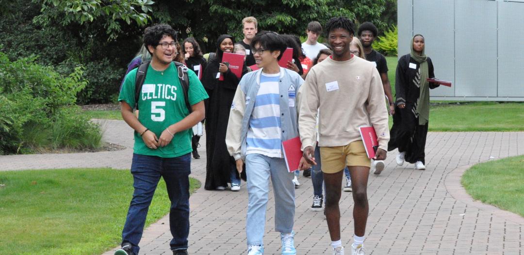 SOAR students (incoming freshmen) walking on campus at 